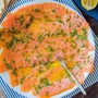 Menu55 - Salmon carpaccio with jalapenos and passion fruit sauce